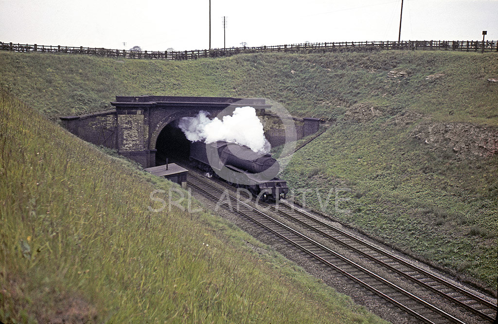 60963 coming out of the short 57 yard long Askham Tunnel on the ECML south of Retford. SRL No 924 