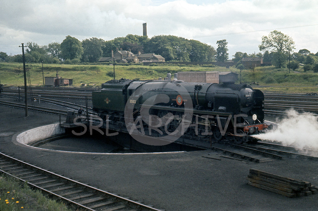 35012 'United States Line' on the turntable at Carlisle Kingmoor after arriving with the RCTS Solway Ranger rail tour 13th June 1964 SRL No 376 