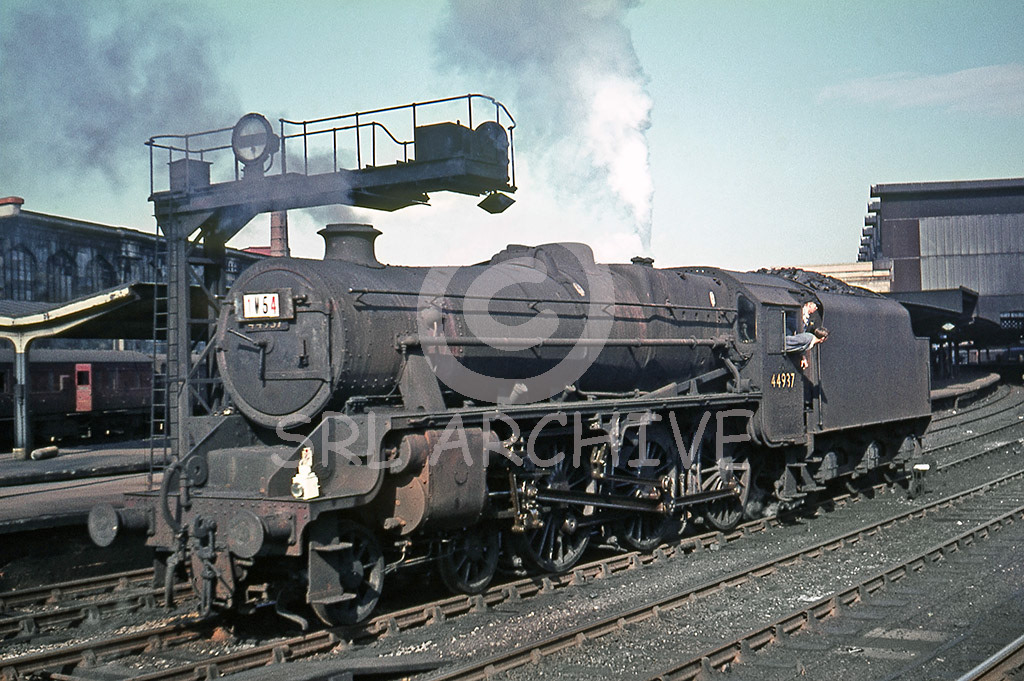 44937 waits to reverse back ar Carlisle Citadel station with IM54 on the centre road to work a summer Saturday Glasgow-Blackpool service SRL No 808 