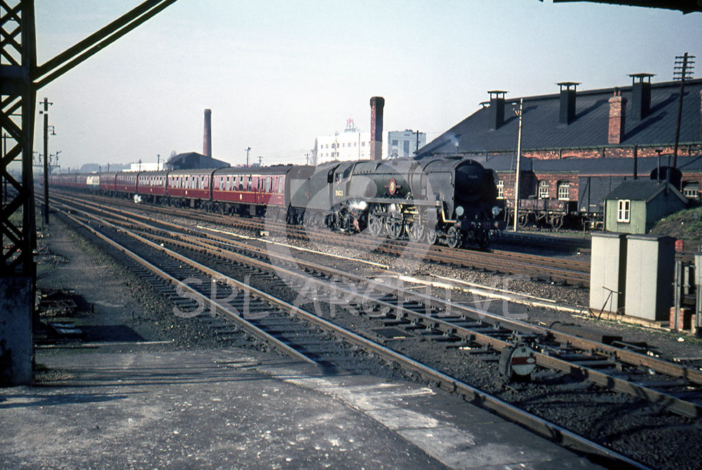 35023 'Holland Afrika-Lines' arriving at Basingstoke with the Pine Express 13th November 1965 Alan Chandler MBE/SRL No 334 
