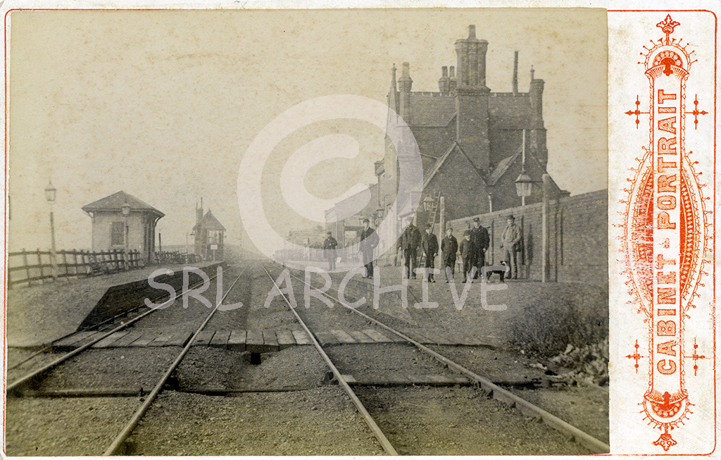 A cdv of Ancaster railway station in Lincolnshire taken by Alfred Arnell of Scarborough but by 1891 was living in the village of Heckington near Sleaford, Lincolnshire practising as a photographer. By 1901 he had moved up to Pontefract. On the 1891 census the station master at Ancaster was a William Matthew Dawson who lived in the station house with his wife Annie and son James with Lily the servant. The signalman at Ancaster living next door was a William brown.Living in the village we find a Henry Thomas Ward, railway porter aged 27. SRL No 303 