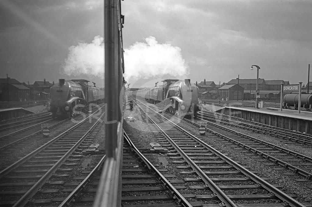 60023 'Sea Eagle' running north through Doncaster station a superb composition around 1956 SRL No 61 