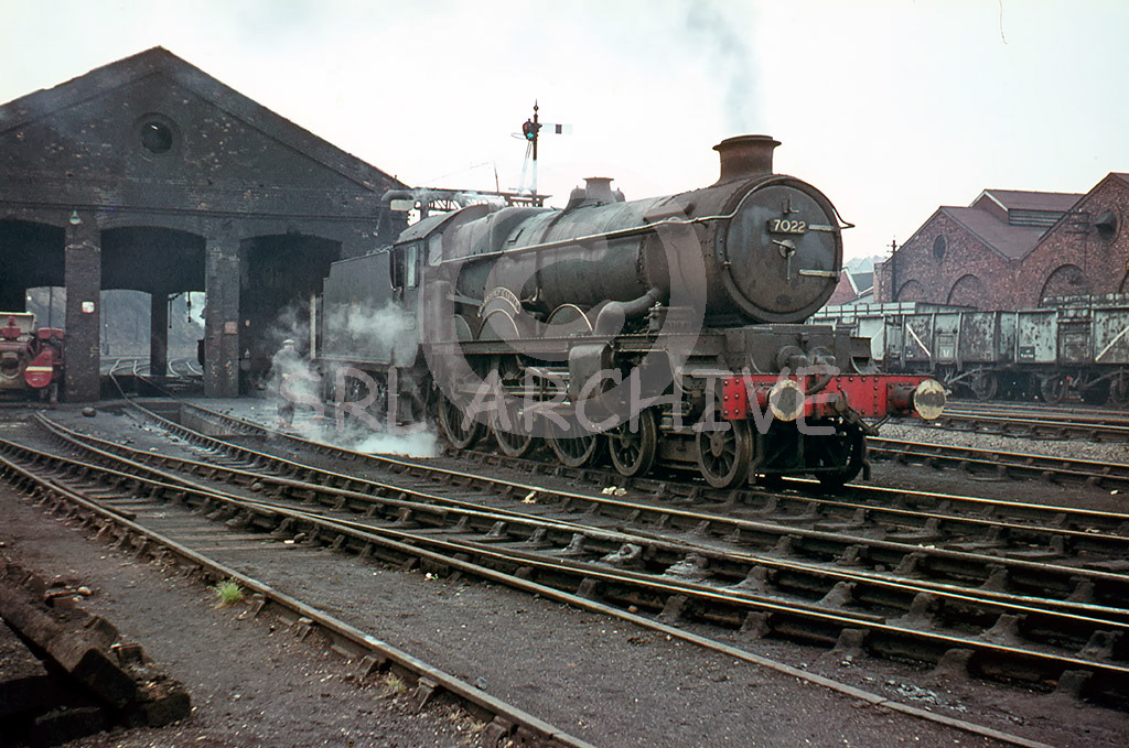 7022 'Hereford Castle' on shed at Worcester in April 1964 SRL No 166 