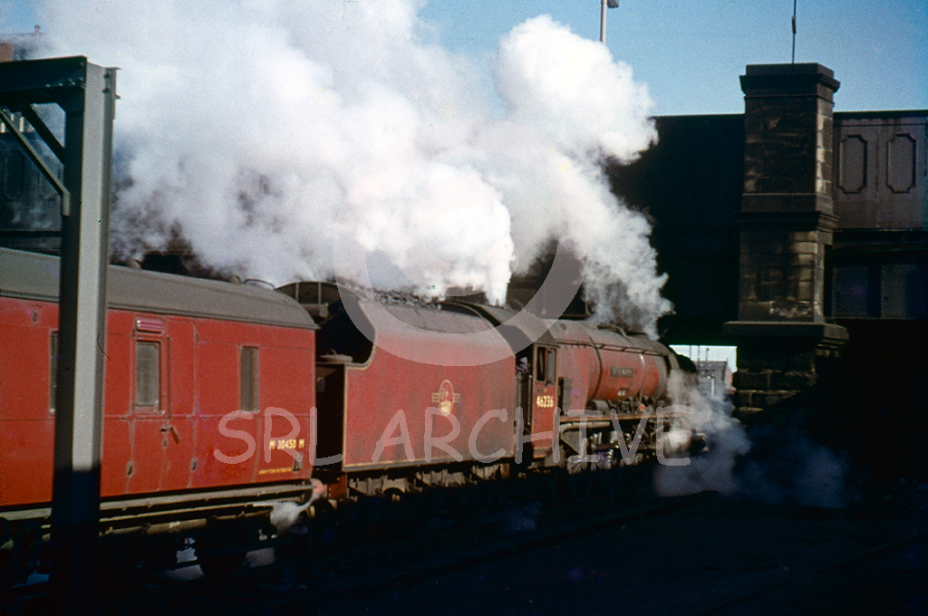 46236 City of Bradford departing Preston station from platform 4 just about to go under Fishergate Bridge with an express for the north 26th May 1961 SRL No 231