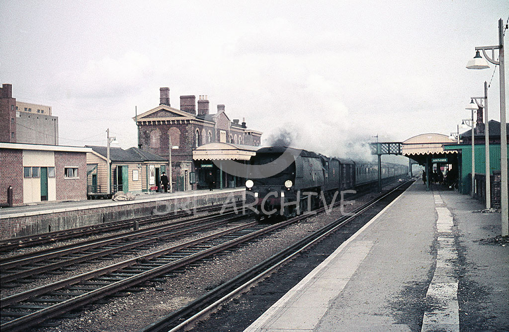 34061 '73 Squadron' up express heading west through Paddock Wood station 1st April 1961 SRL No 899 