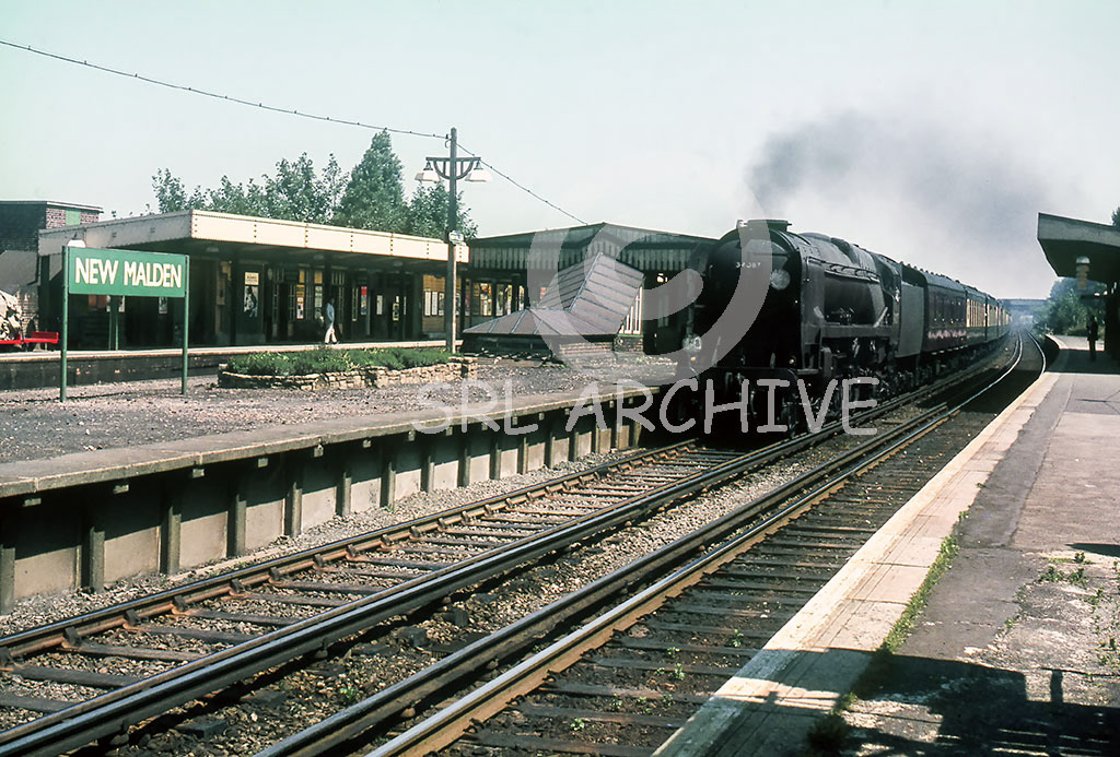 34087 '45 Squadron' passing through New malden station near Wimbledon on the down Bournemouth Belle around 1966 SRL No 1106 