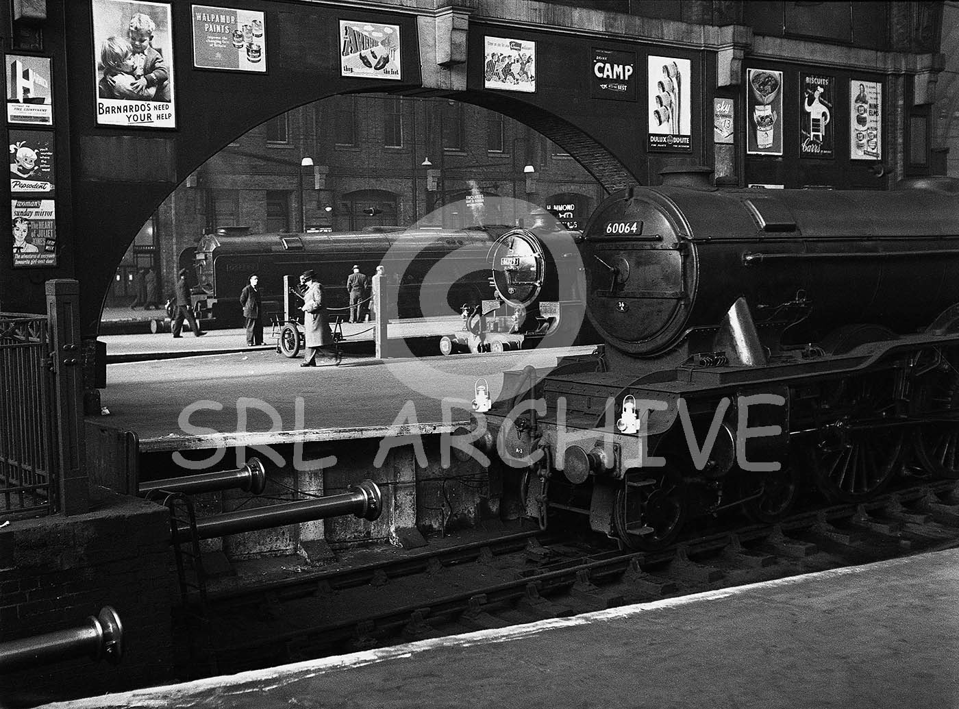 60064 'Tagalie' at London Kings Cross station in platform 5 15th February 1958 also in view A1 60131 'Osprey' B1 61379 'Mayflower' lovely framed shot SRL No 821 