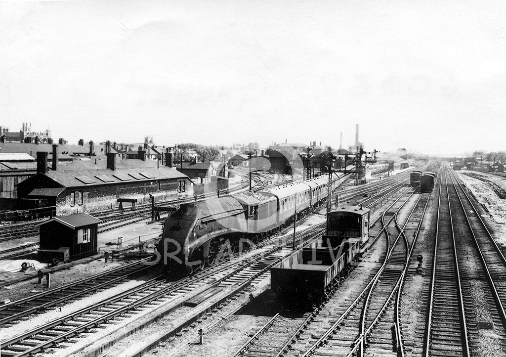 60032 'Gannet' pulls away from Peterborough North station with a down express 1st June 1963 Malcolm Castledine/SRL No 1059-4