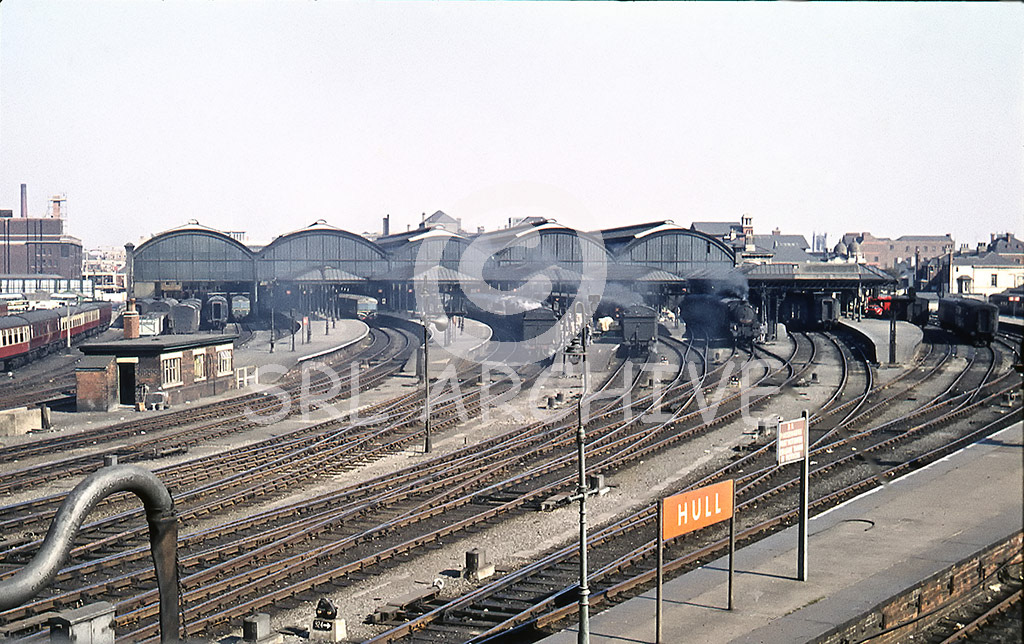 Panoramic view of Hull Paragon station with steam and DMU on view 10th September 1959. The five arched train shed dating from an NER rebuilding of 1904, which accommodated fourteen platforms SRL No 879 