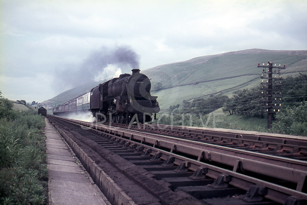 44905 heading through the Lune Gorge seen here at Dillicar water troughs in 1967 SRL No 276 