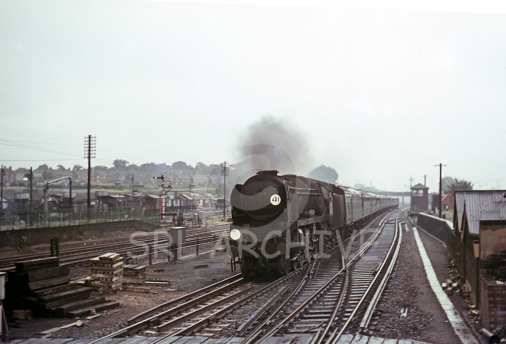 34014 'Bere Alston' at speed near Basingstoke on the down fast headcode Waterloo-Bournemouth express no date Brian Noakes/SRL No 396 