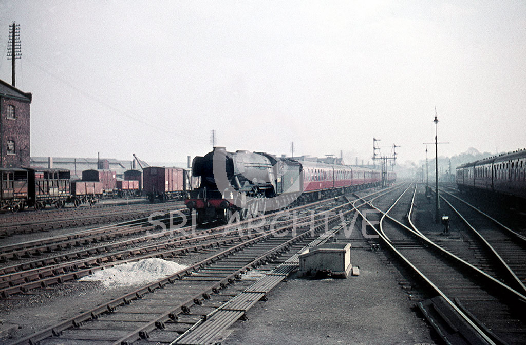60050 'Persimmon' arriving into Grantham station from London Kings Cross in March 1962 SRL No 695 