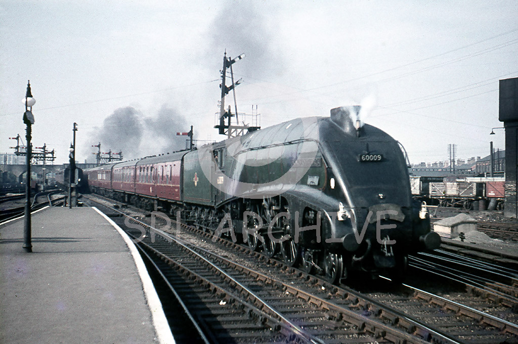 60009 'Union of South Africa' south through Peterborough North station with the un-named Saturday working using the midweek Elizabethan stock note reverse headboard Saturday 2nd September 1961 SRL No 57 