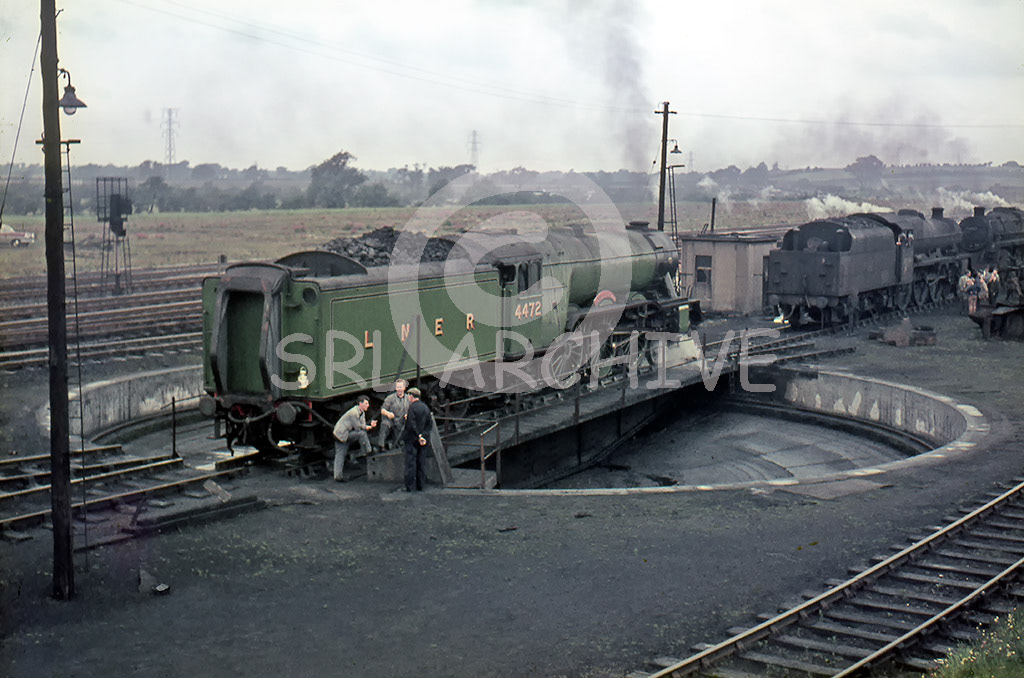 4472 'Flying Scotsman' on the turntable at Carlisle Kingmoor after arriving on the WRS Pennine rail tour SRL No 75  4th September 1965