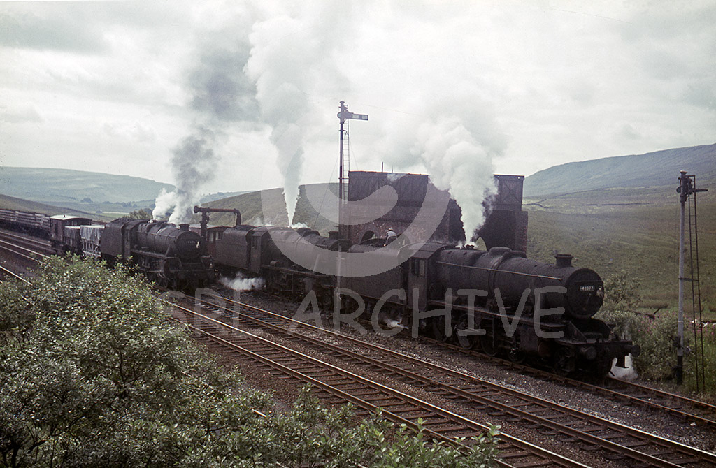 48077+48506 pause at Blea Moor for water with the Blackburn Rails to Carlisle on the 19th August 1967 with  class 5 44575 on the left SRL No 352 