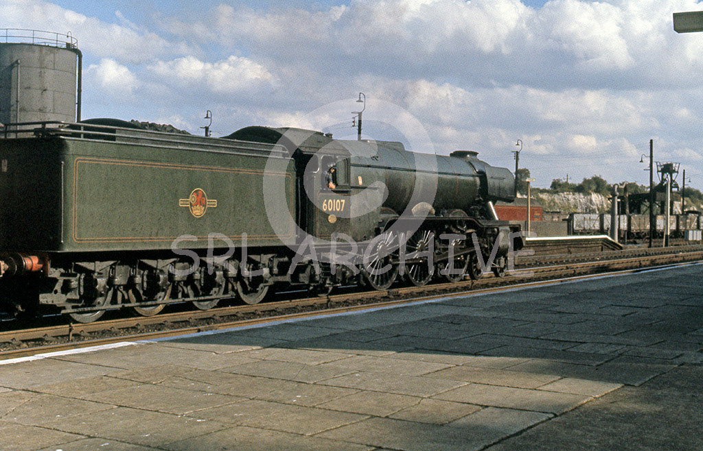 60107 'Royal Lancer' at Hitchin heading south in August 1962 with the original GN coal rail tender SRL No 49 
