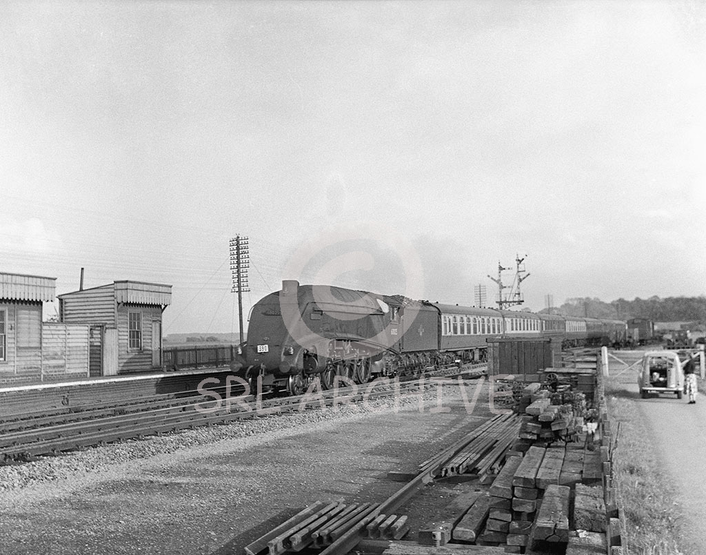 60025 'Flacon' at Barkston station north of Grantham with a down express in 1957 Les Perrin/SRL No 761 