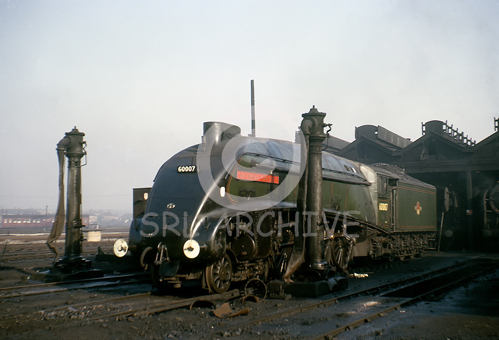 60007 'Sir Nigel Gresley' at Newton Heath MPD 22nd October 1965 being prepared to work the Paddington Streamliner rail tour the following day SRL No 535 