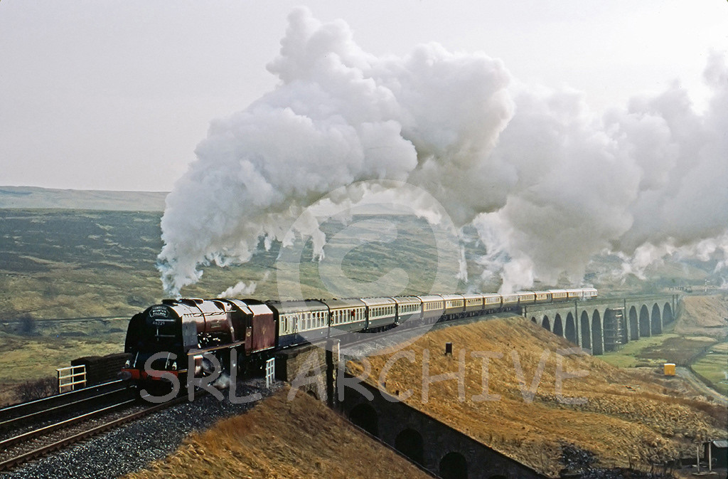 46229 Duchess of Hamilton crossing Dandry Mire viaduct or Moorcock viaduct with the northbound CME 12th March 1983 Geoffrey Edwards SRL No 477 