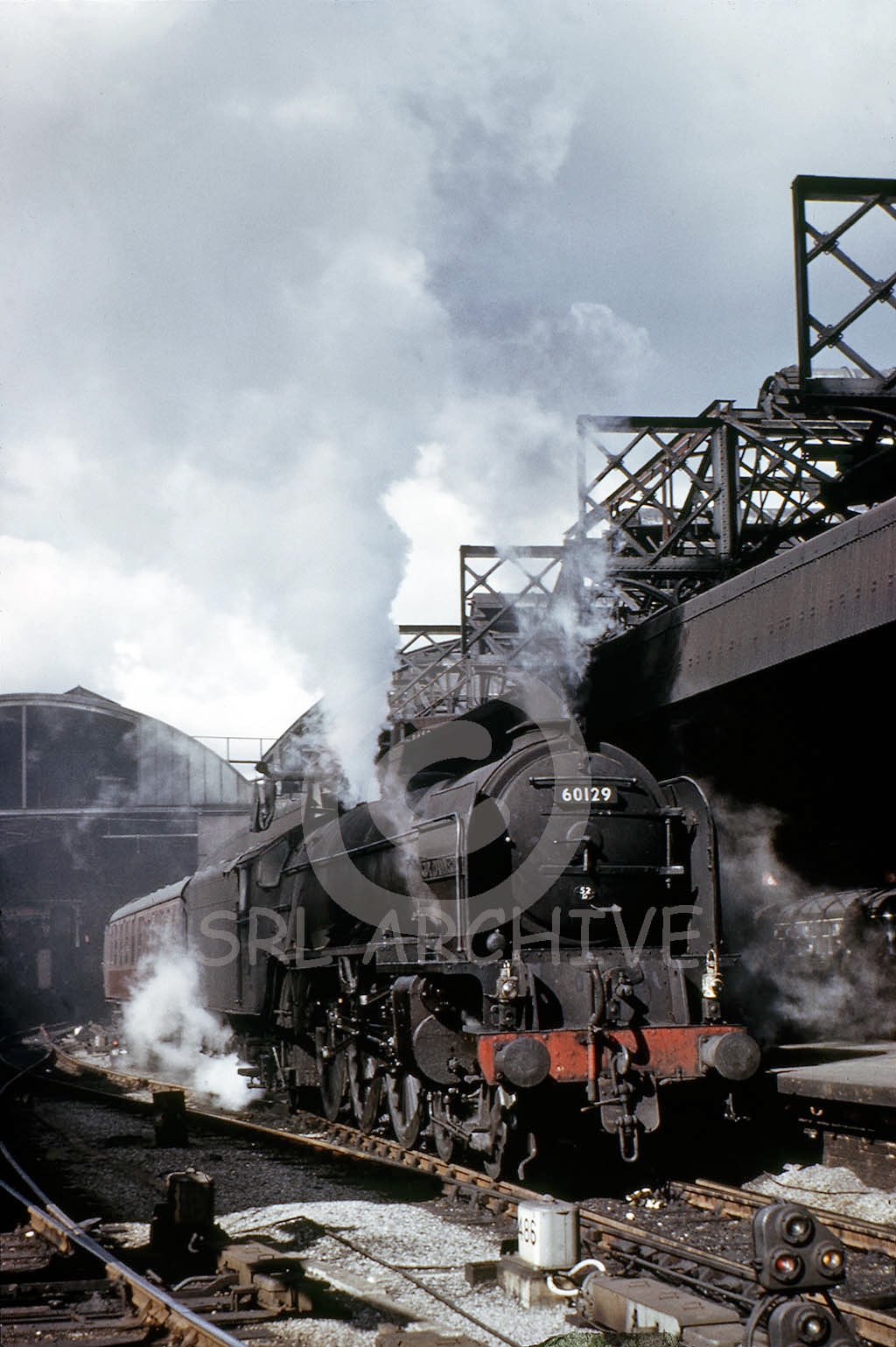 60129 'Guy Mannering' at Newcastle Central station departing for the north on the 09.15 York-Glasgow Queen St 29th August 1964 SRL No 69 