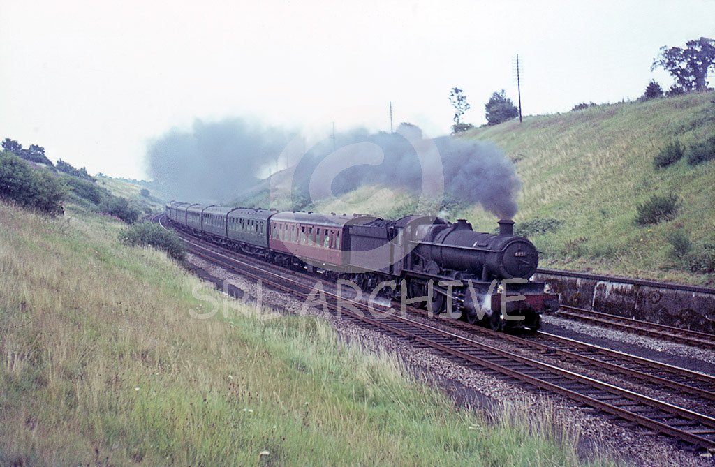 6851 'Hurst Grange' on Hatton Bank working a south of England-Midlands Holiday extra in Sept 1964 John Carter/SRL No 586 