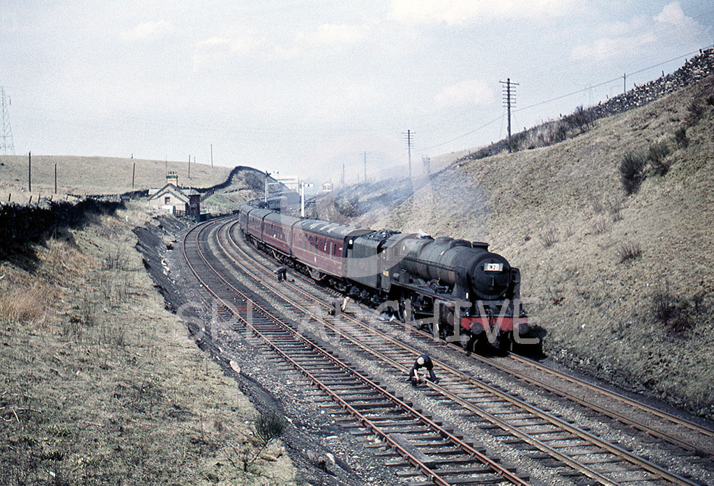 46108 'Seaforth Highlander' on an up express 1M25 10.15 Glasgow-Euston at Shap Summit 24th April 1962 note the gangers at work fish plate lubrication SRL No 716 