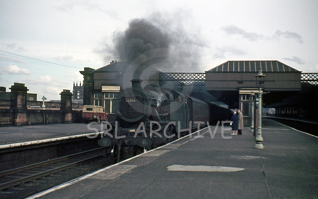 42264 2-6-4T pulls away from Paisley Gilmour station with the 12.08 Glasgow Central - Gourock service in 1965 SRL No 599 