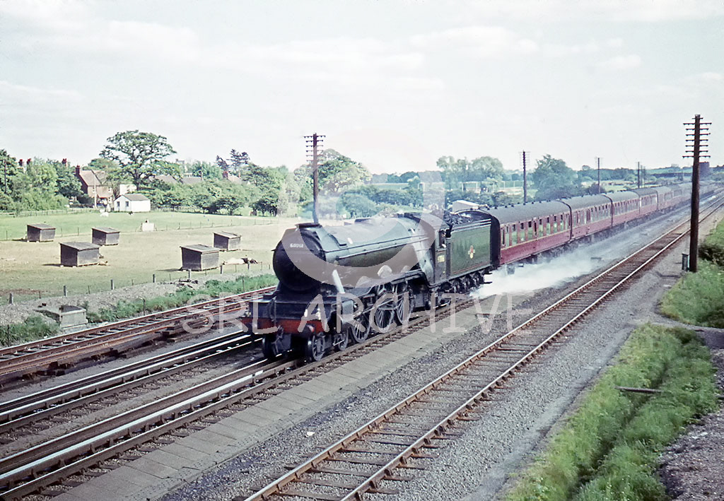 60061 'Pretty Polly' picks up some water on Langley water troughs with the 4.50pm London Kings Cross-York 22nd May 1961 Alan Chandler MBE/SRL No 307 