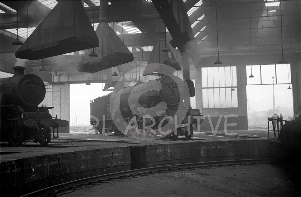 60085 'Manna' inside Neville Hill, Leeds roundhouse with Fairburn 2-6-4T 42699 no date SRL No 441 