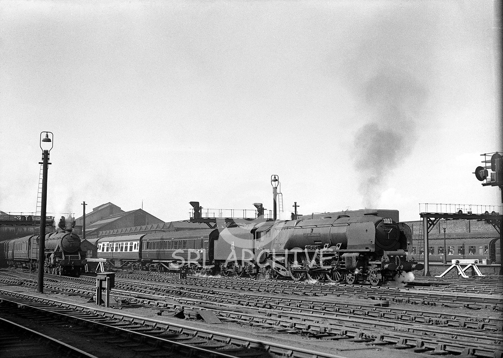 46240 City of Coventry seen here at Crewe with the sloping smokebox from its streamlined days on a Perth-Euston express 10th June 1950 SRL No 891 