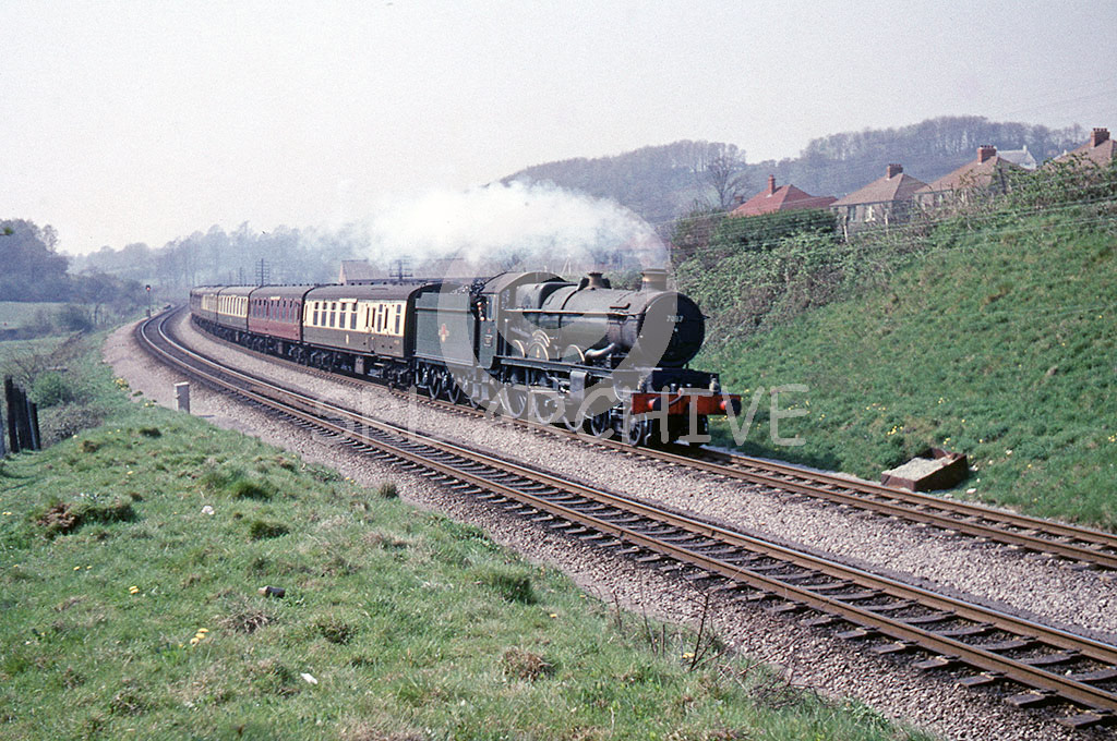 7037 'Swindon' at Ely near Cardiff with the Capitals United express  11.10 Milford Haven-Paddington 28th April 1962 SRL No 579 