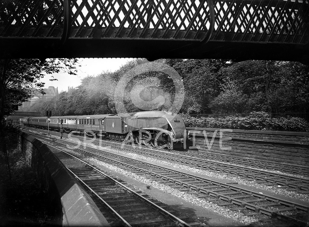 60011 'Empire of India' after leaving Edinburgh Waverley station seen here at Princess St Gardens 1950-52 SRL No 888 