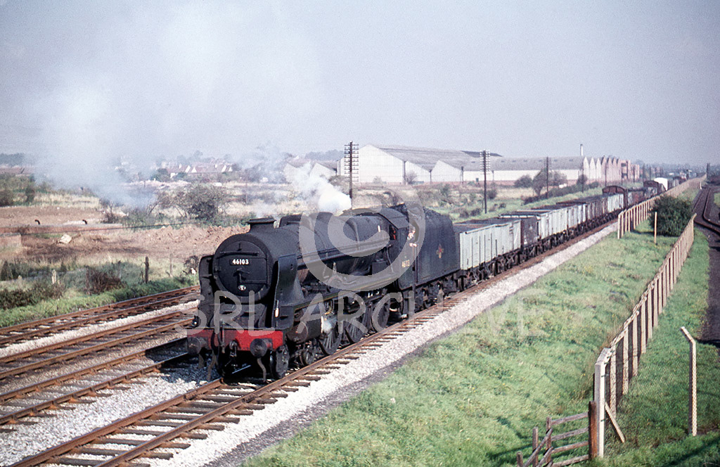 46103 'Royal Scots Fusilier' at Stenson Lane Bridge in 1961 with a freight train of coal wagons SRL No 687 