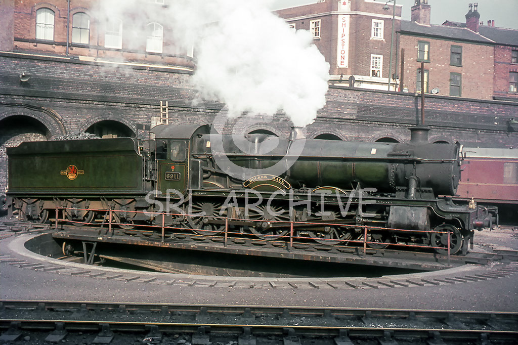 6911 'Holker Hall' as come to grief on the turntable at Nottingham Victoria station. It had arrived on 1N63 Bournemouth West-Bradford Exchange Saturday 8th August 1964 SRL No 1121 