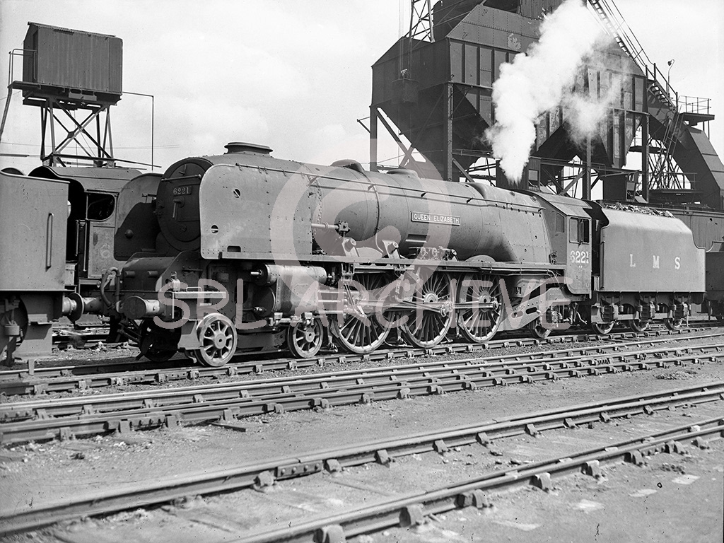 46221 Queen Elizabeth at Crewe in wartime black livery sloping smokebox from the streamlined days 1946 SRL No 208