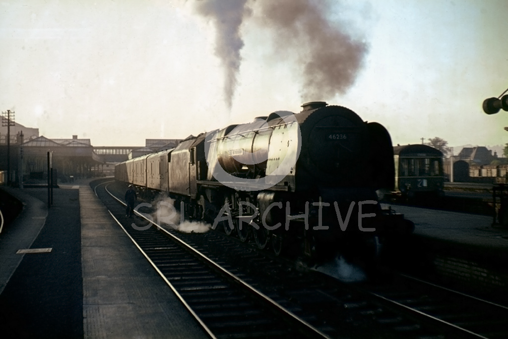 46236 City of Bradford at Stirling with a class C parcels heading south around 1963 SRL No 1052 