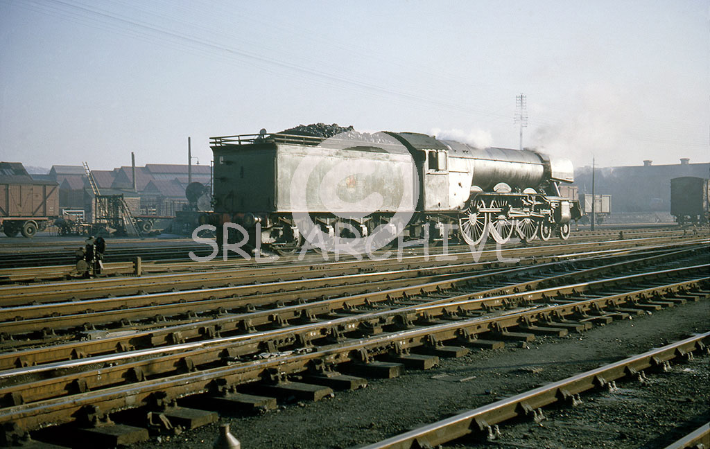 60049 'Galtee More' catching some lovely evening light in the yard at Grantham still with the original GN coal rail tender 21st December 1962 Alan John Clarke/SRL No 682 
