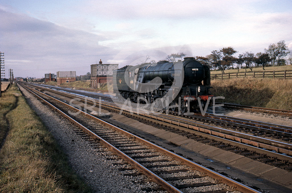60128 'Bongrace' light engine move seen here at Danby Wiske water troughs near North Allerton ready for the rail tour on the 19th September 1964 LCGB The Pennine Ltd SRL No 545 