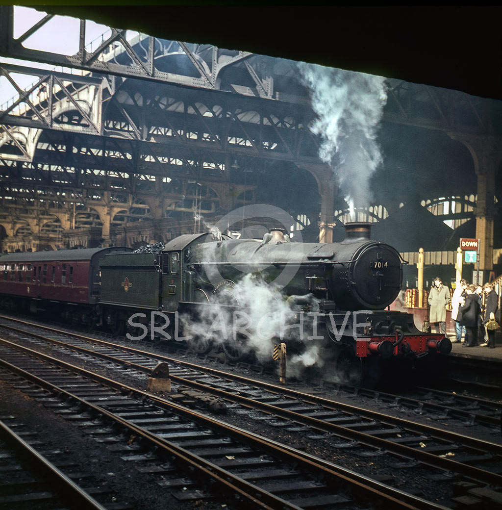 7014 'Caerhays Castle' waiting to depart from Birmingham Snow Hill station a wonderful study of light and shadow around 1962/3 SRL No 1151 