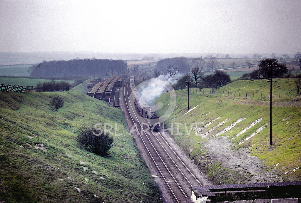 60107 'Royal Lancer' on an up express passing Highdyke sidings and just about to enter Stoke Tunnel near Grantham 27th April 1963 Alan John Clarke/SRL No 681 