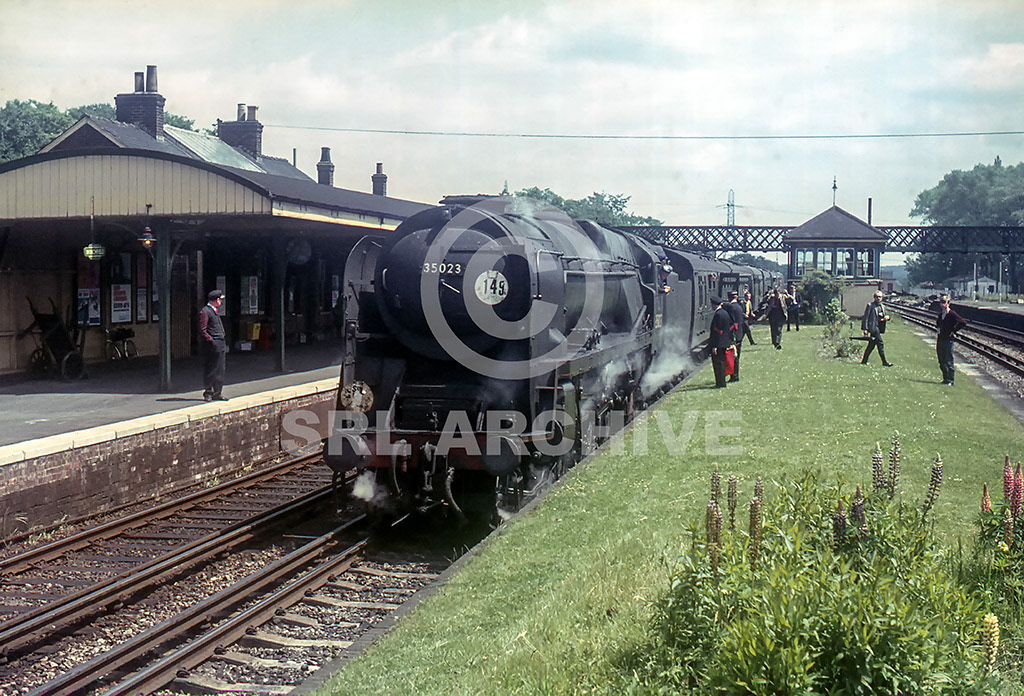 35023 'Holland-Afrika-Line' standing on the Up Main-Line track at Winchfield station working route 149 Waterloo-Bournemouth express Sunday 2nd July 1967. SRL No 1163
