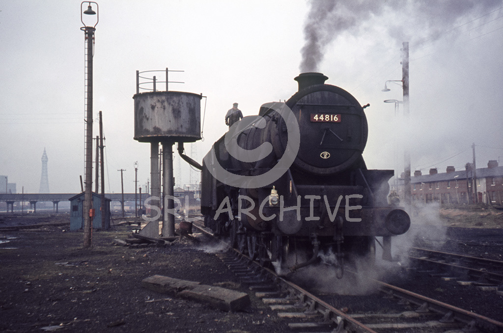 44816 getting a top up in the yard at Blackpool South(Central) 16th February 1968 in the background we see Blackpool Tower and Bloomfield Road the home to Blackpool FC SRL No 951 