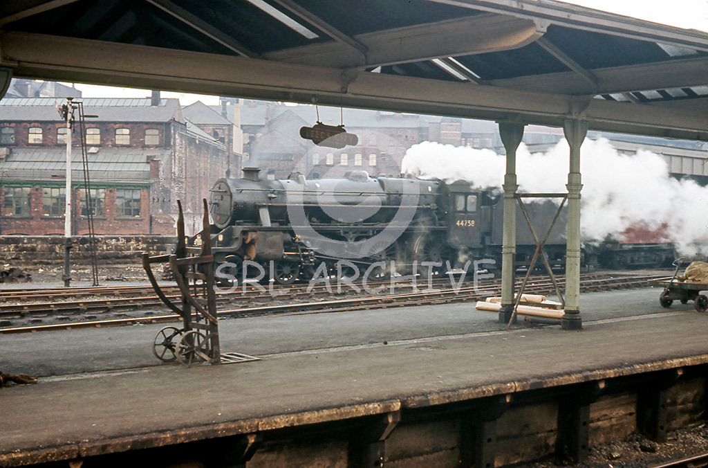44758 at Leeds City station running through with a Class C freight around 1962 SRL No 1010