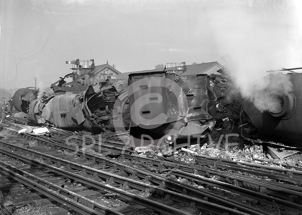 Harrow & Wealdstone rail crash 8th October 1952 08.19 express from Perth collided at speed into the rear of the Tring-Euston local passenger that had stopped in the station. Within a few seconds the Euston-Liverpool express crashed into the Perth locomotive causing 112 fatalities the worst peacetime rail crash in the UK. Daily Mirror original glass negative SRL No 453