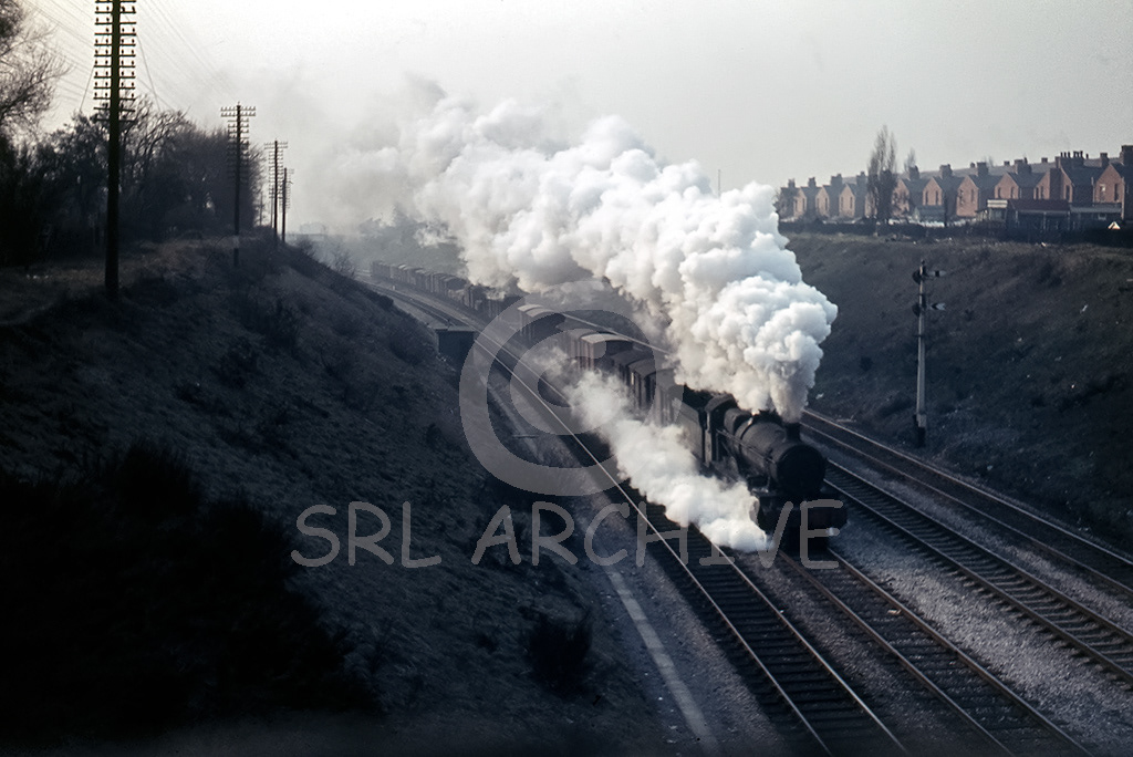 6853 'Morehampton Grange' with a Class C freight at Acocks Green near Birmingham 23rd March 1963.  This was a well used location for the distinguished photographer Michael Mensing who passed away in 2014 aged 80 years old. This could be an original slide taken by him. SRL No 748  