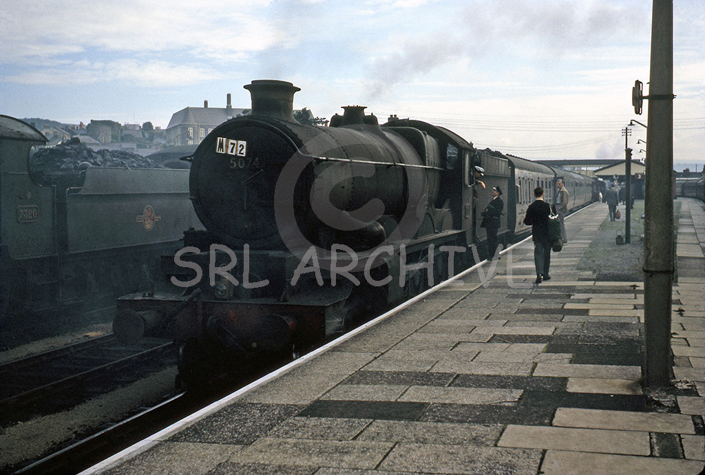 5074 'Hampden' backing onto a relief service for London at Carmarthen station 18th August 1962 SRL No 528 