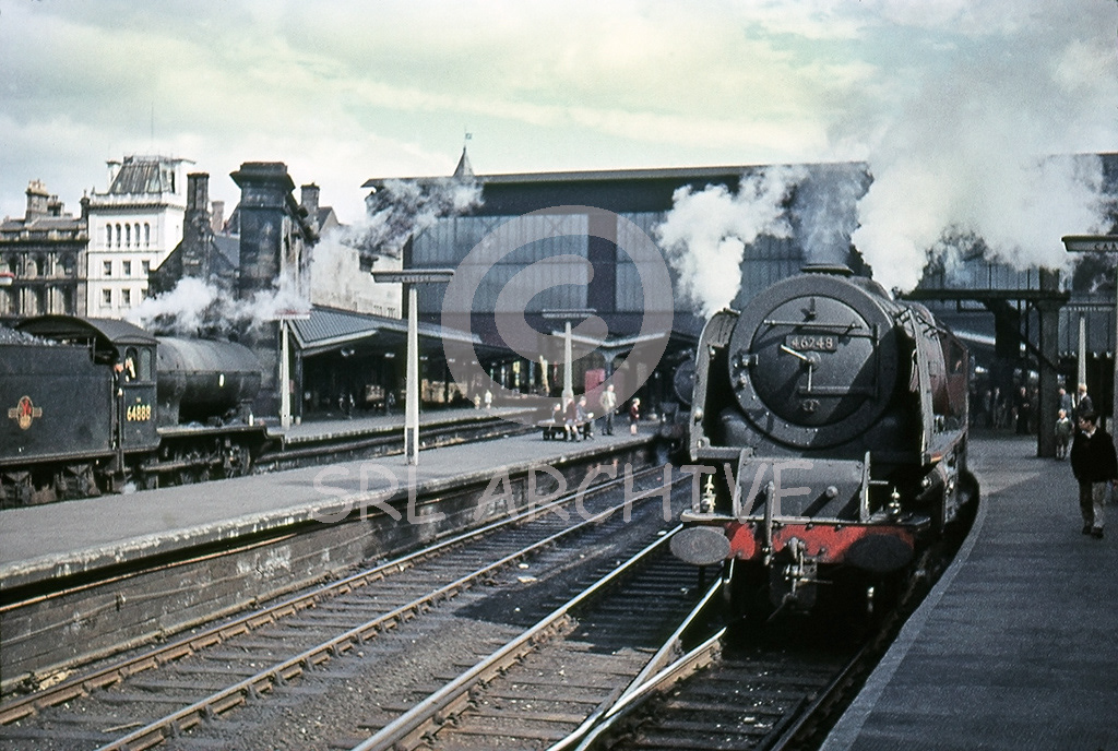 46248 City of Leeds waiting to depart north from Carlisle Citadel station 20th May 1961 with a former LNER J39 class No 604888 in the bay platform SRL No 799 