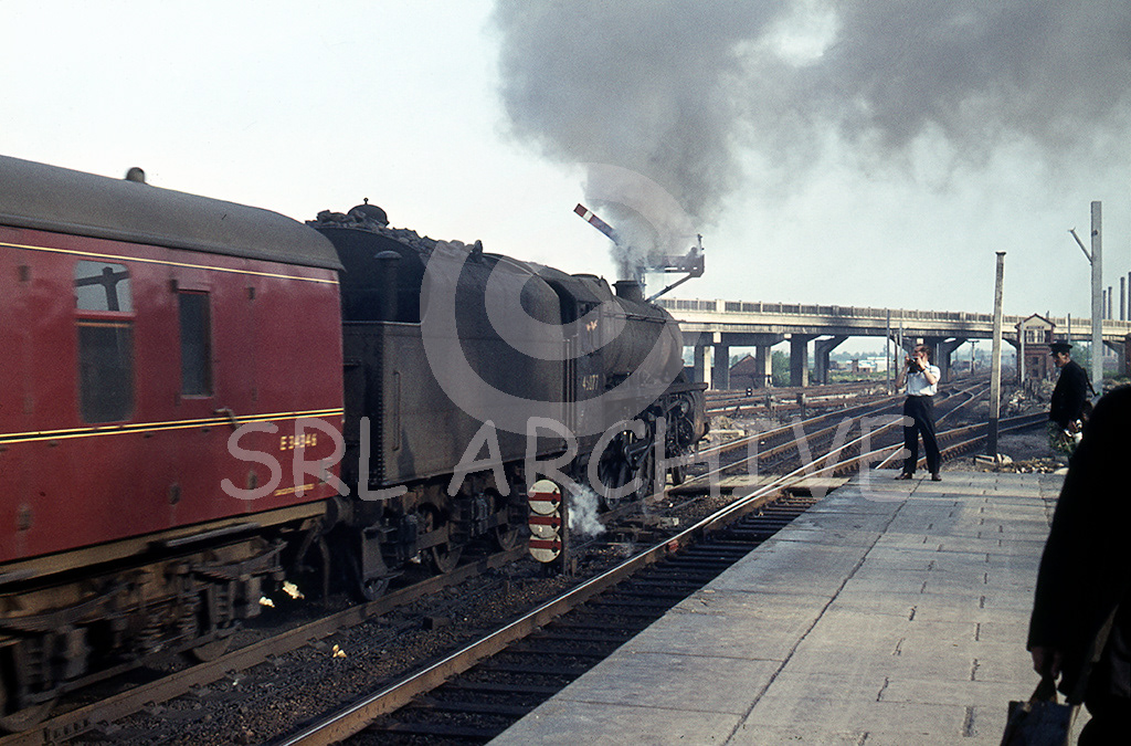 45077 heading south on an express through Bletchley station in June 1964 SRL No 281 