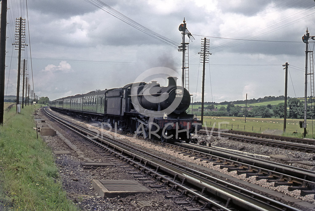 6863 'Dolhywel Grange' on the 8.55am Sheffield Victoria-Bournemouth West seen here at Goring water troughs 13th July 1963. SRL No 966 