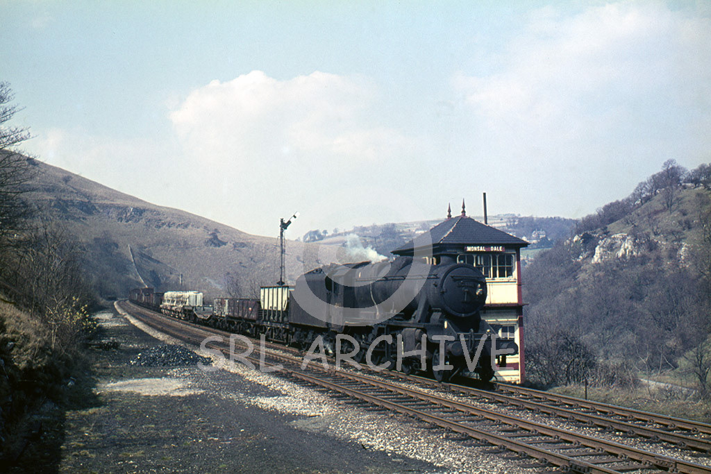 48410 on a mixed freight passing Monsal Dale signal box 3rd April 1965 SRL No 1048 